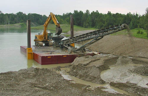 Caterpillar 245 in Canadian Quarry